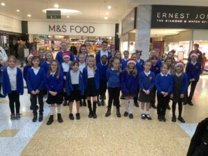 Shinewater School pupils singing in Eastbourne